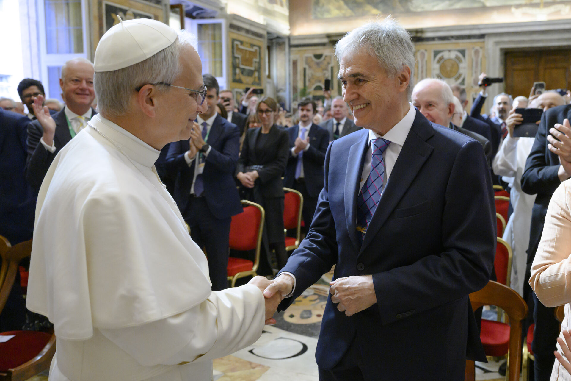 Pope Leo XIV greets Paolo Garonna, CAPP president, during an audience with CAPP members.